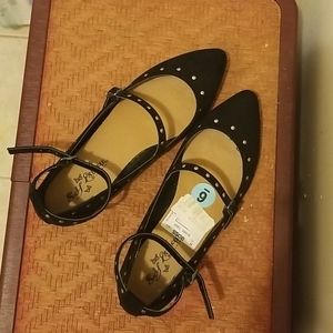 Black, pointed toe, studded flats.